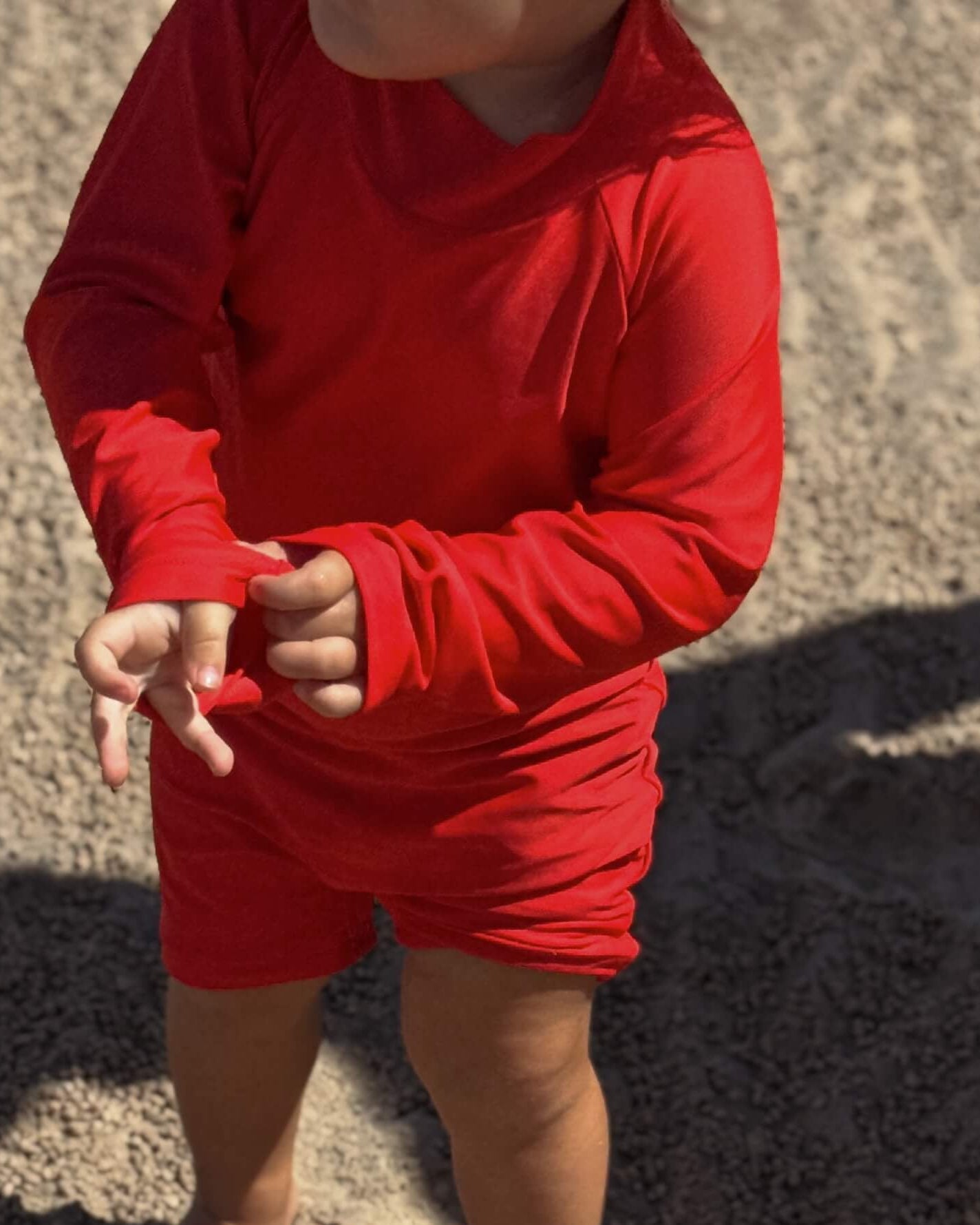 bright red upf50 baby swimsuit