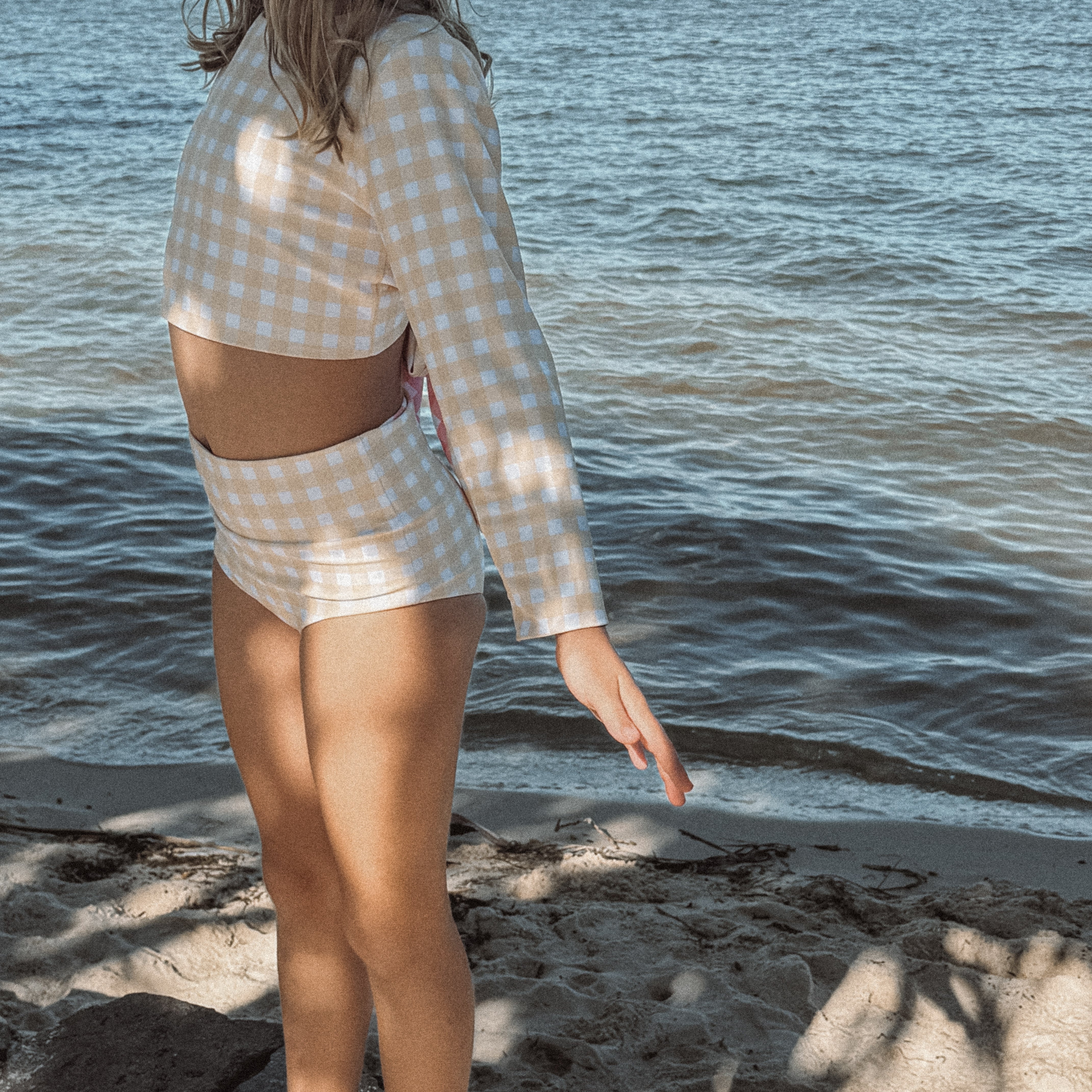 Person girls bathers swimsuit outfit standing by the water