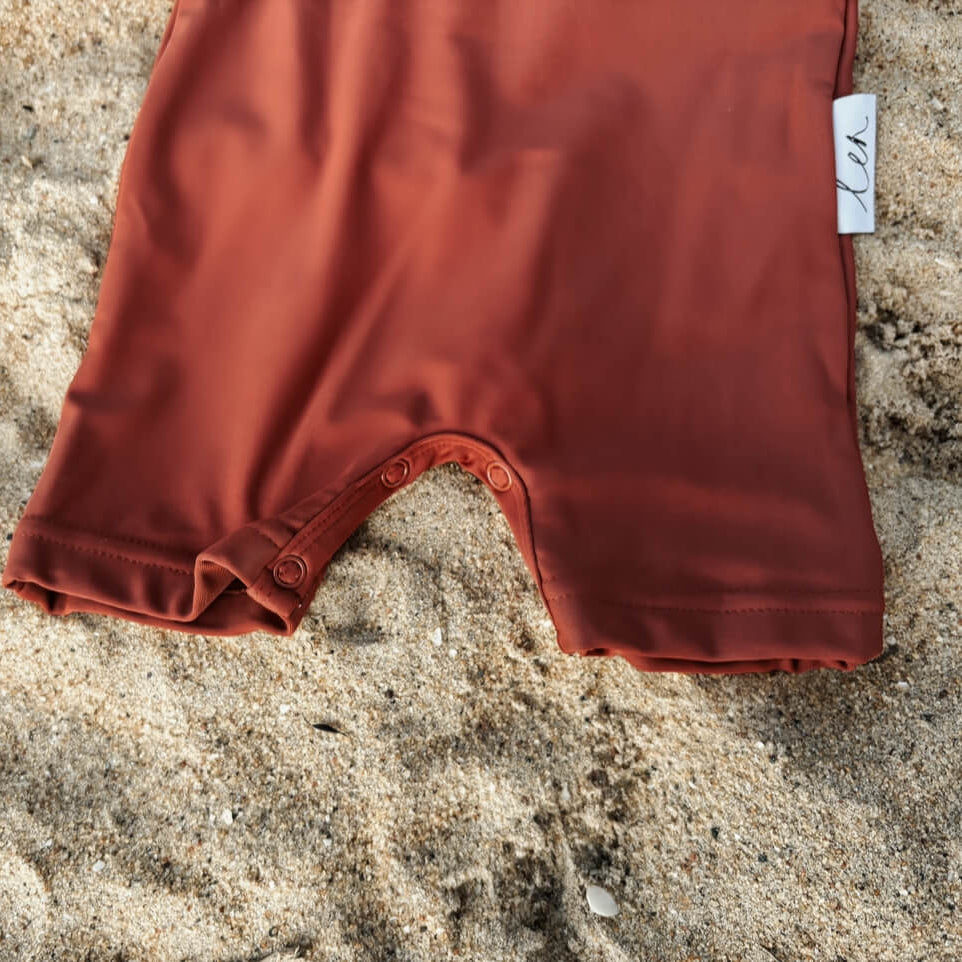 one piece rash suit with change snaps