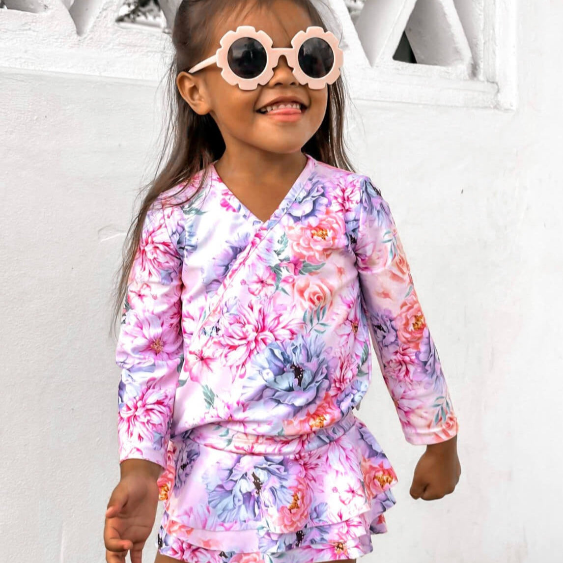 Girl in Ballerina Rash guard top and matching swim bloomers with frills