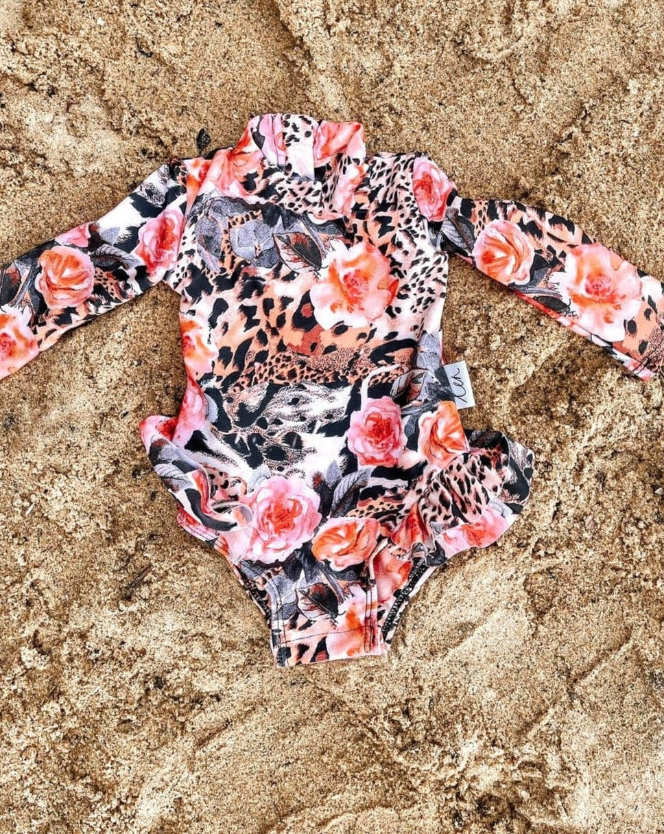 Baby, toddler and girls swimsuit with nappy change snaps in leoaprd print with florals