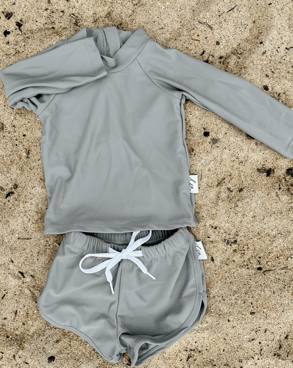 Baby and toddler rashguard swim set in grey with large zip