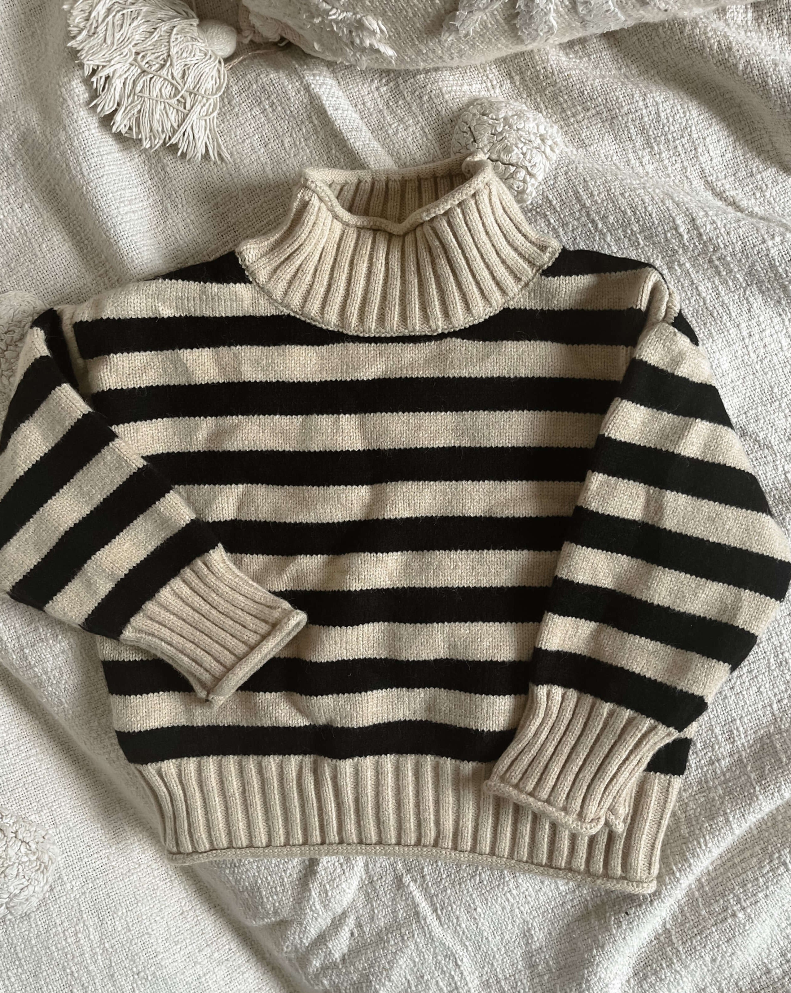 high neck wind breaking oversized kids knitted sweater striped in black and biscuit color.