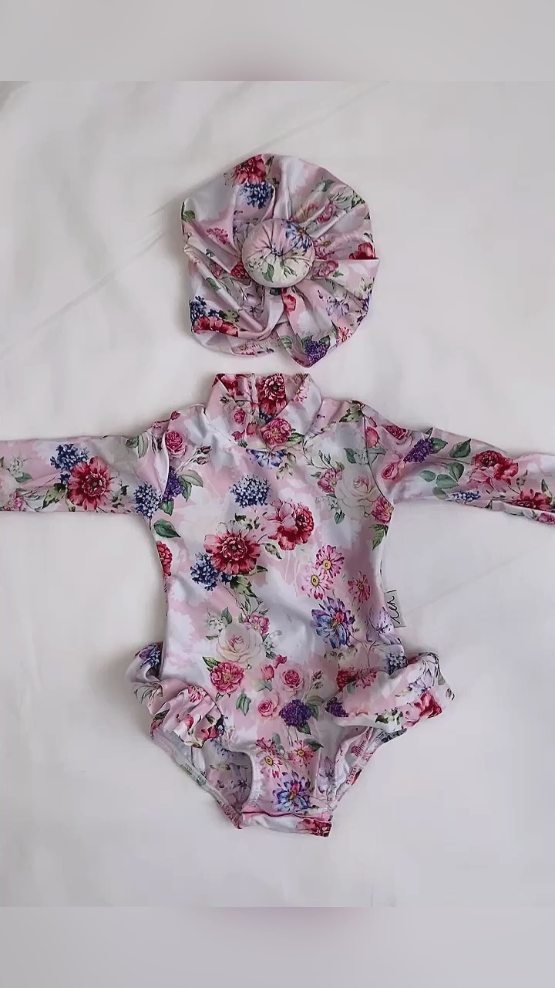 baby in a nappy change long sleeve swimsuit