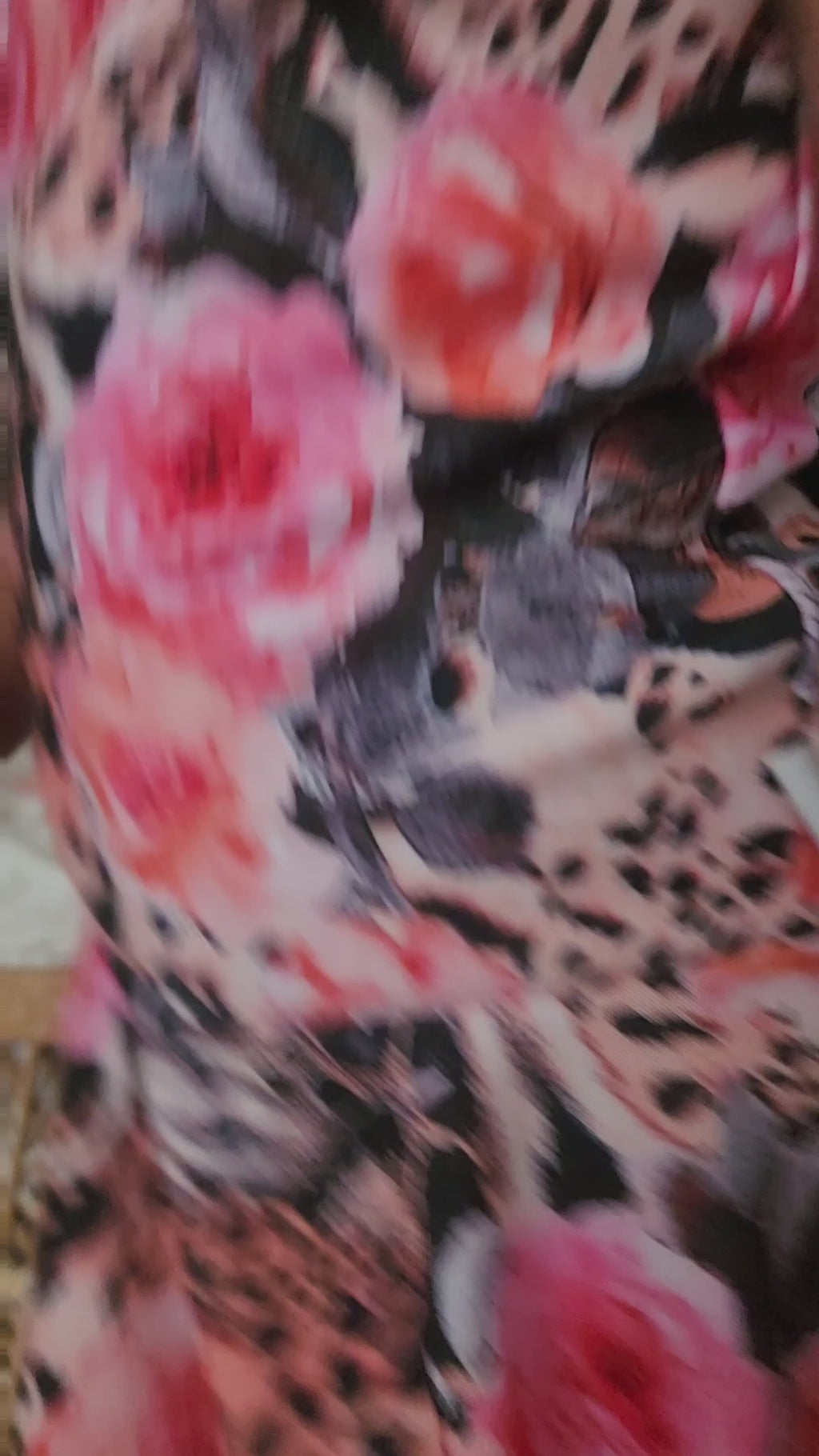 young girl wearing a leopard print floral swim dress 