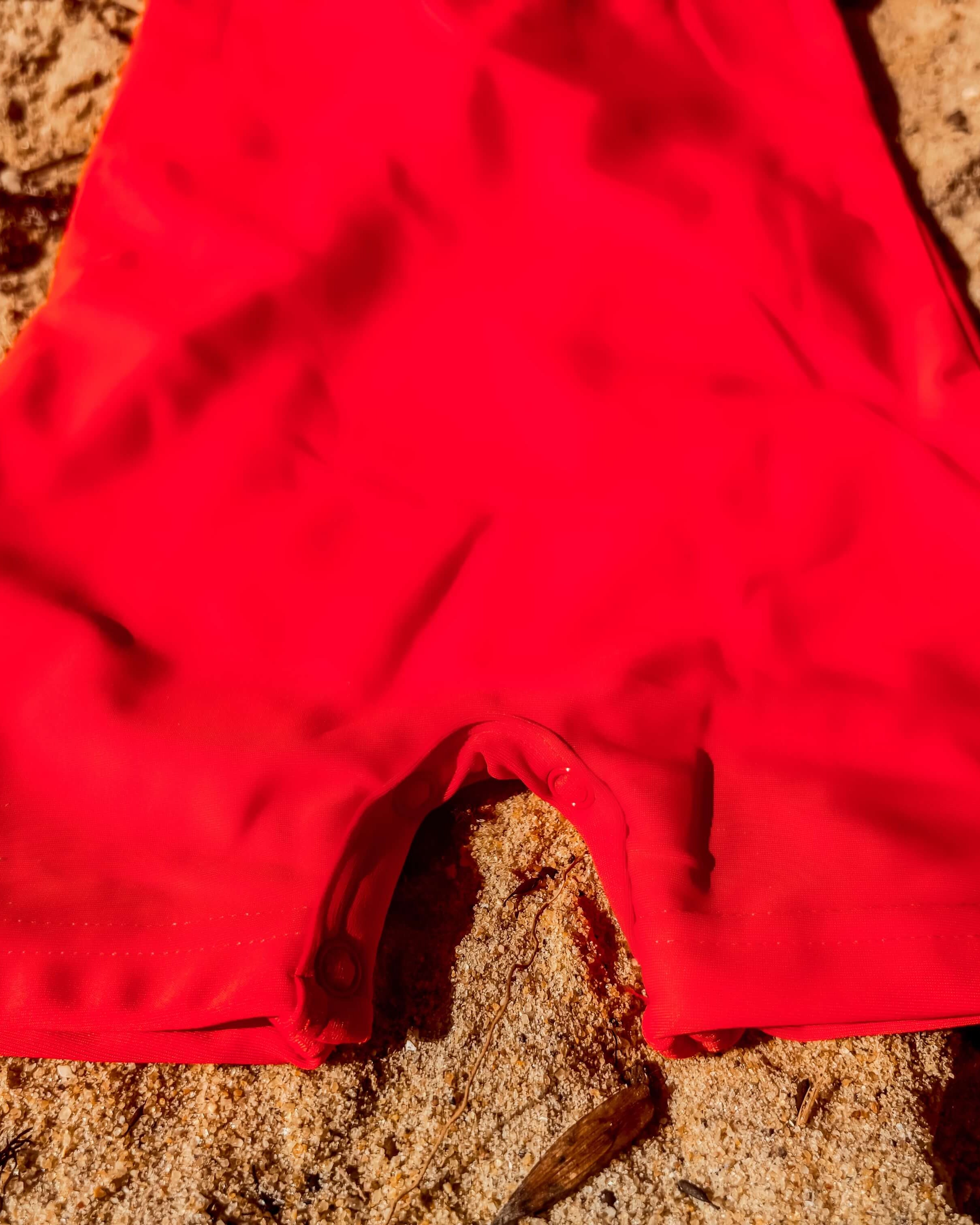 concealed snaps for changes and easy dressing. neon swimsuit boys and girls