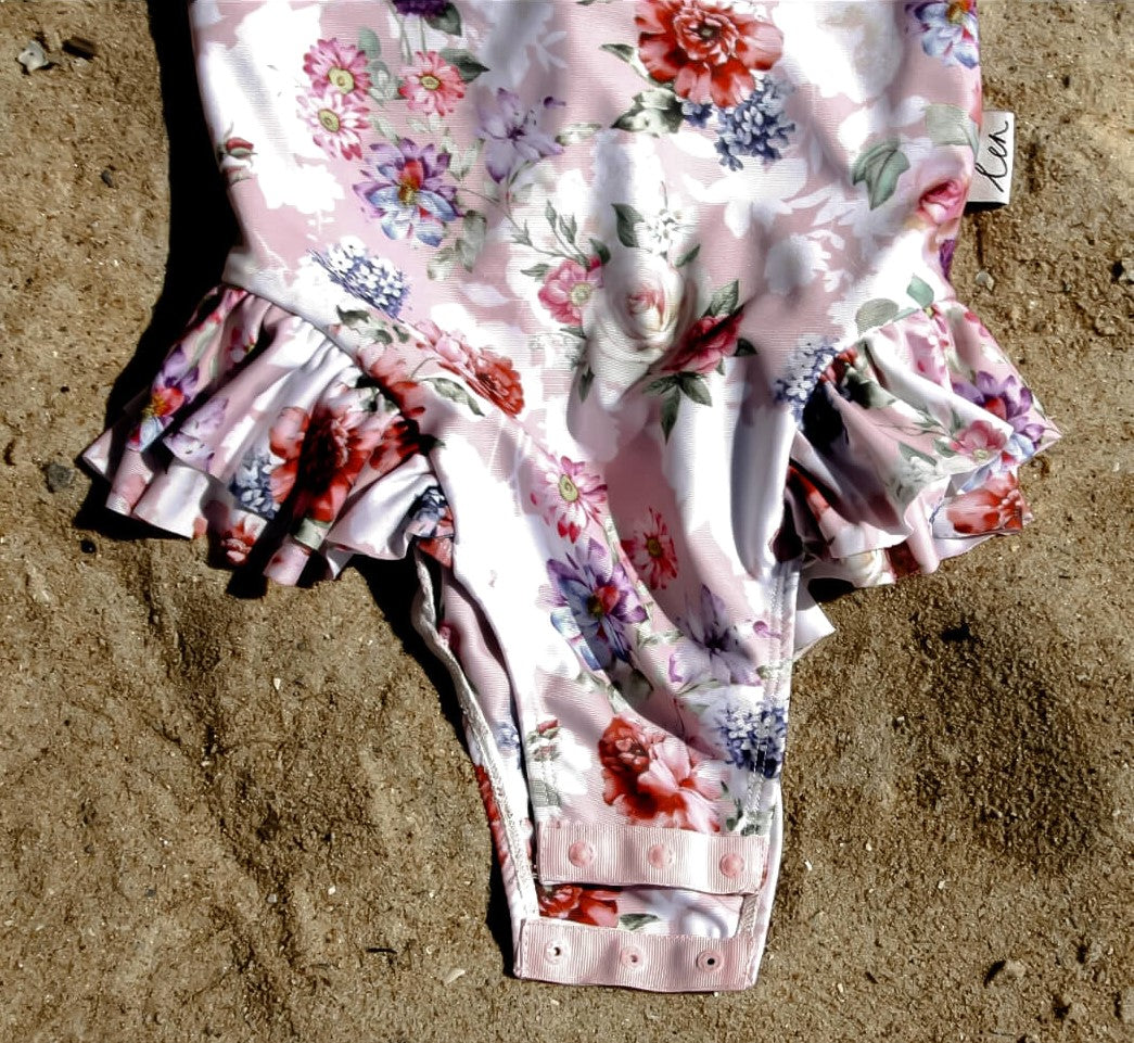 Baby girls long sleeve swimsuit with nappy change snap closures